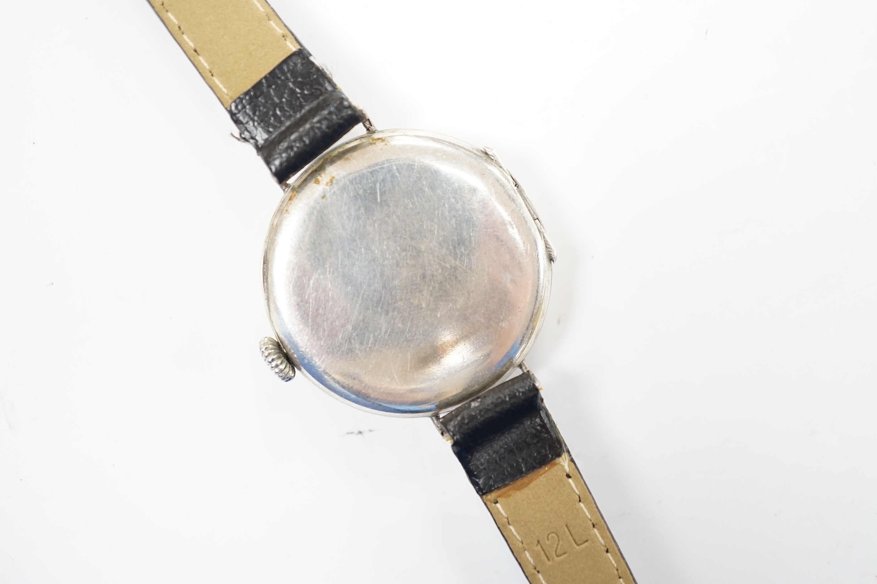 A gentleman's continental 800 standard white metal manual wind WW1 trench wrist watch, with 'telephone dial' cover, on later associated strap.